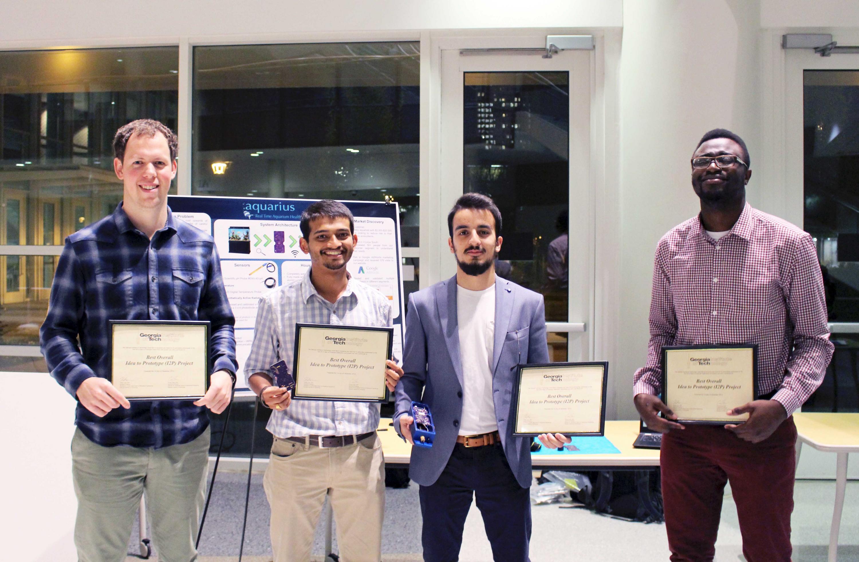 Fall 2016 1st Place Winners, Team Aquarius
Sam Youngdale (ME 2017), Elie Ghossain (ME 2017), Daniel Albequerque (EE), Olatide Omojaro (CS 2018)