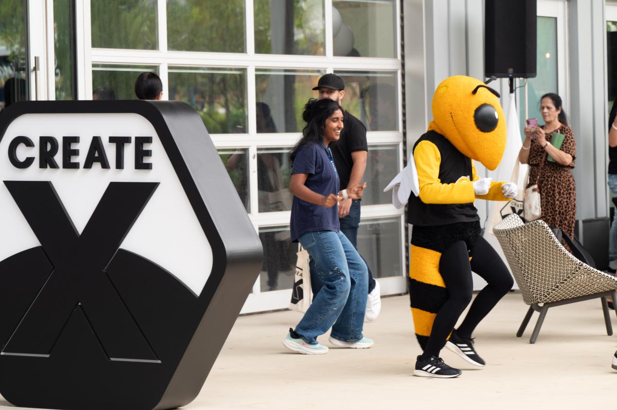 buzz abnd girl dancing outside